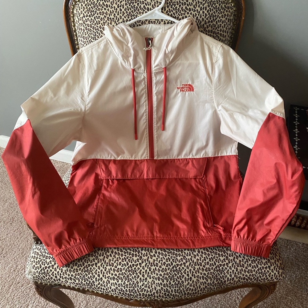 The North Face orange and cream windbreaker
